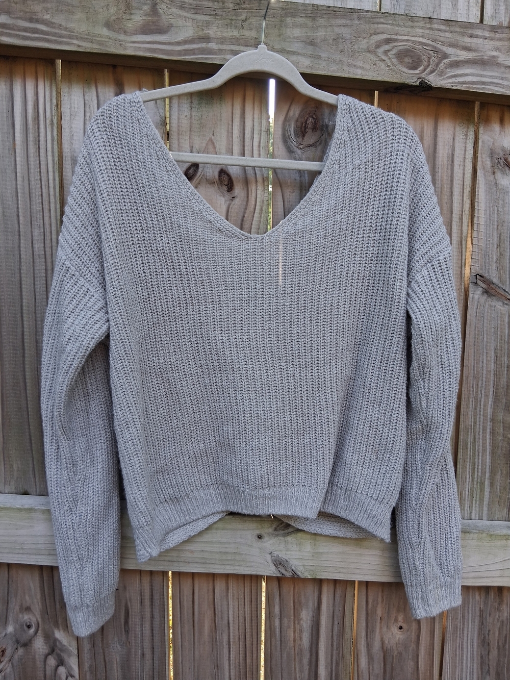 Cozy V-Neck Knit Sweater With Cross Back